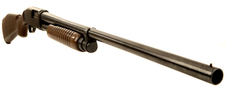 Deactivated pump action shotgun by Squier Bingham.