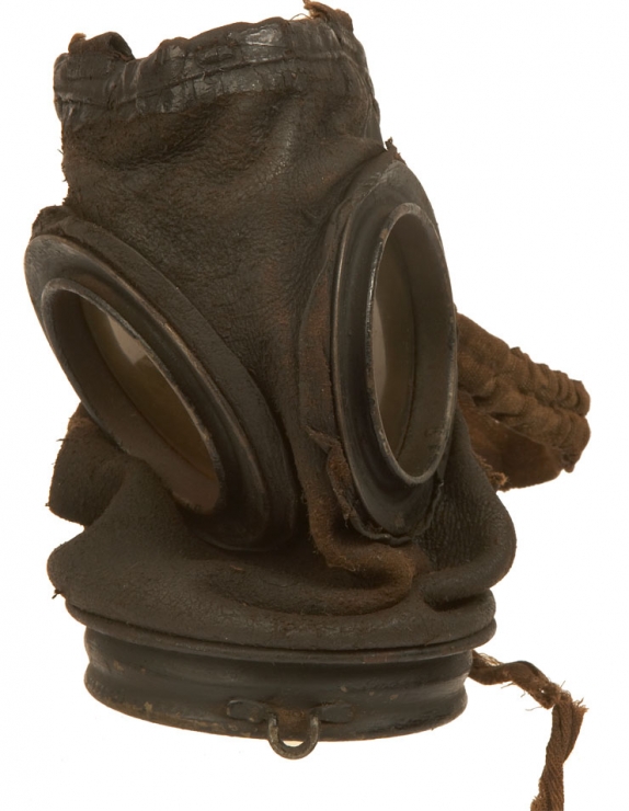 First World War German leather gas mask with container.