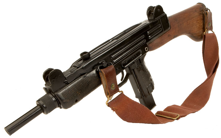 Deactivated Uzi with removable wooden stock.